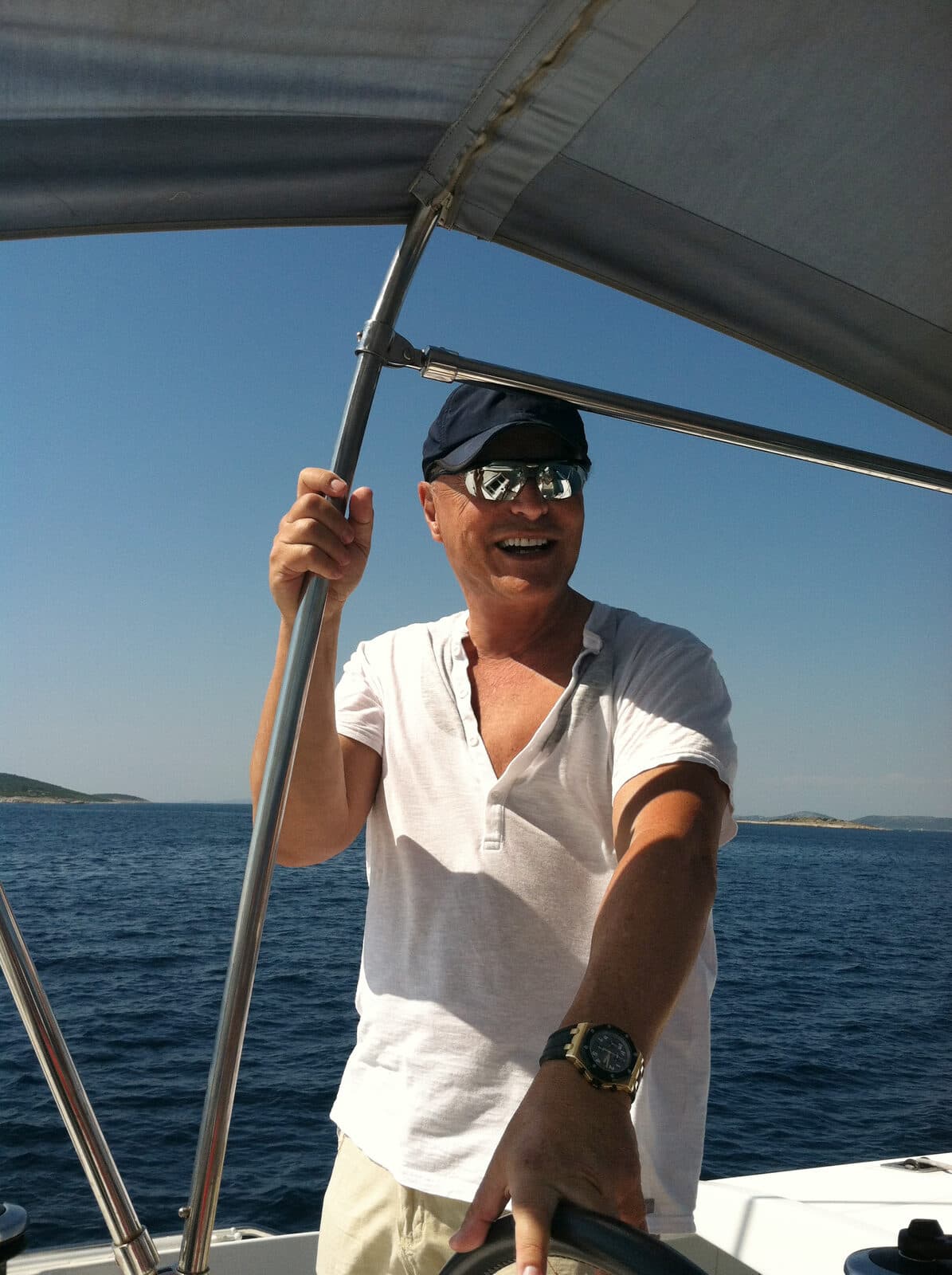 Steve Bendat, founder of Aquantis Group, at the helm of his boat